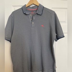 Tommy Bahama men’s polo shirt. Size Large. Blue striped shirt